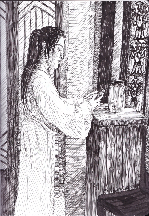woman standing at a window